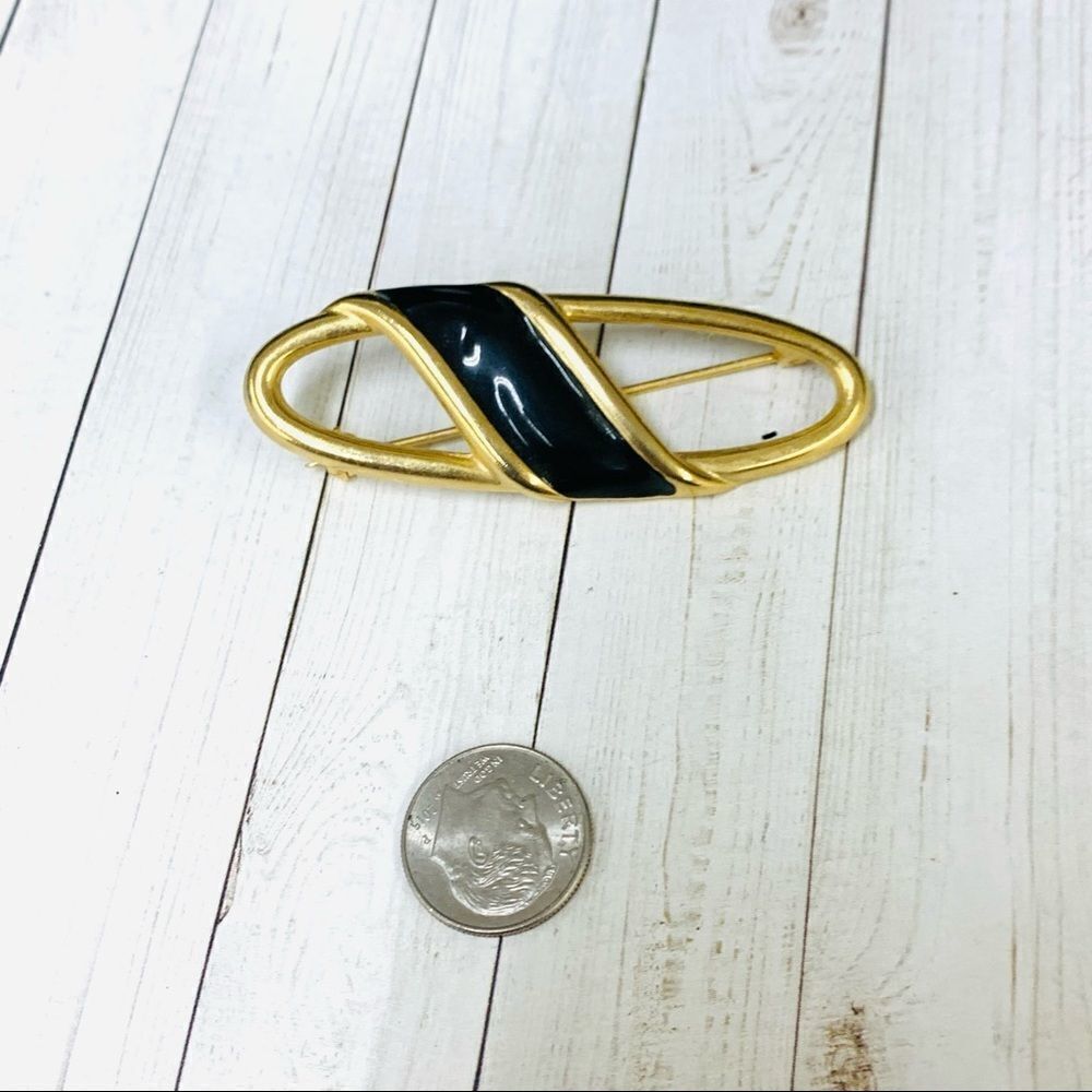 Gold and Black Brooch‎